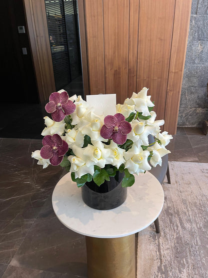 White roses and pink orchids